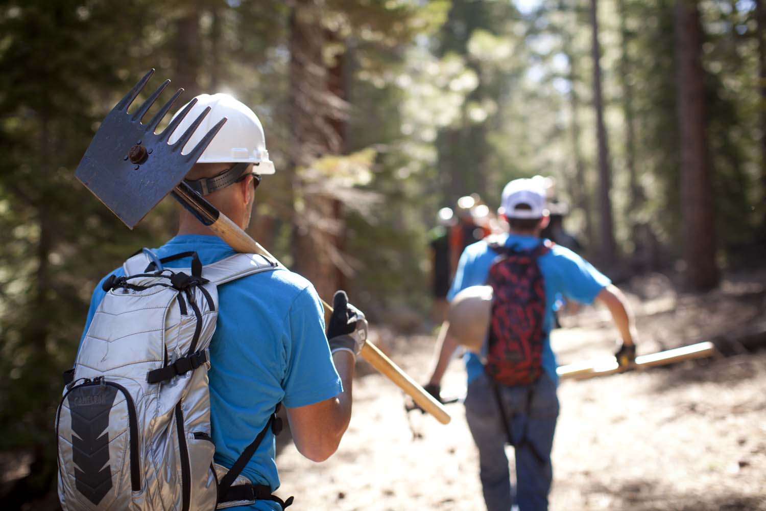 People working on a mountain bike trail, Shimano Trail Born mountain bike trail advocacy 