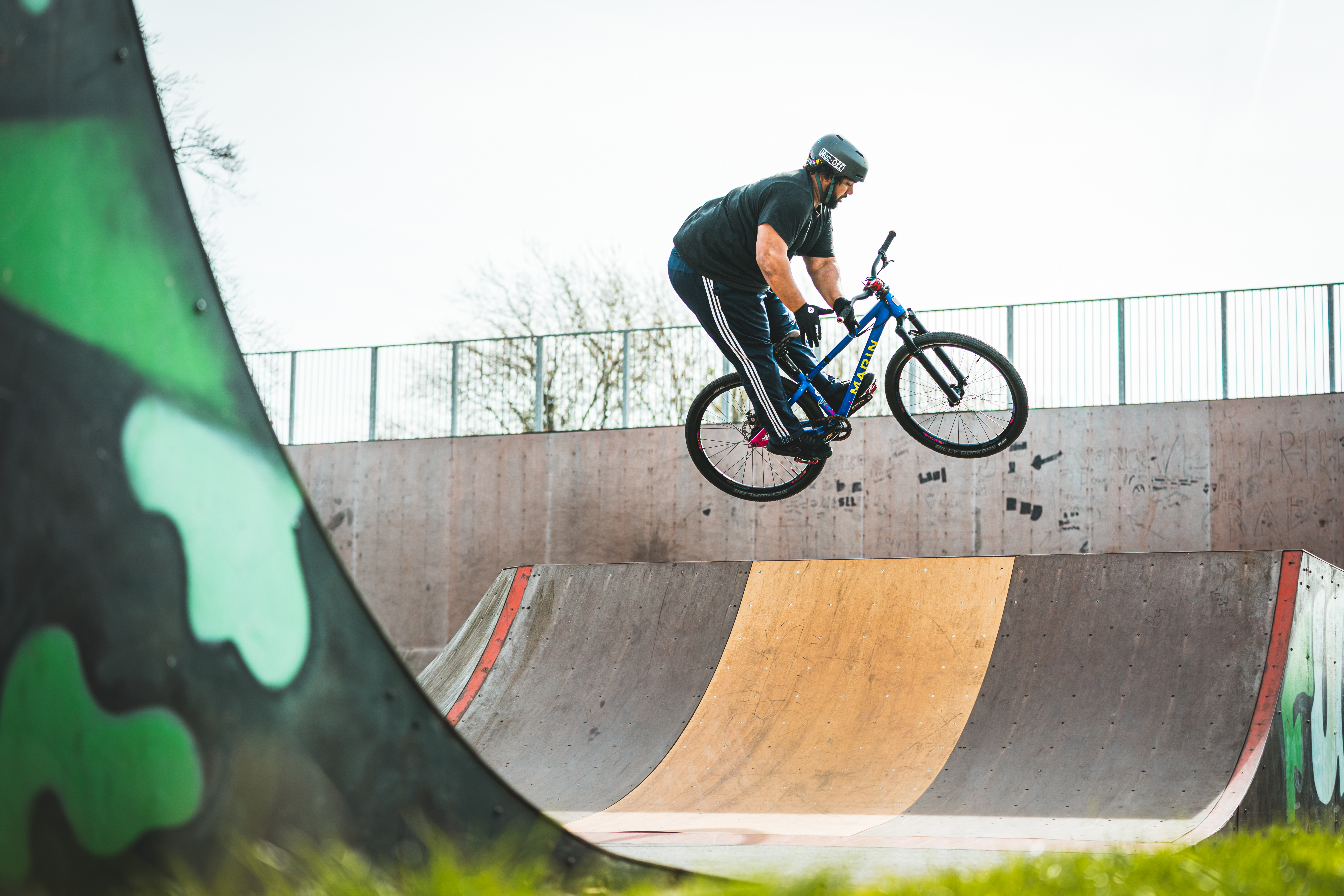 Shimano MTB athlete Leo Smith doing a bar spin while riding his Mountain bike in London