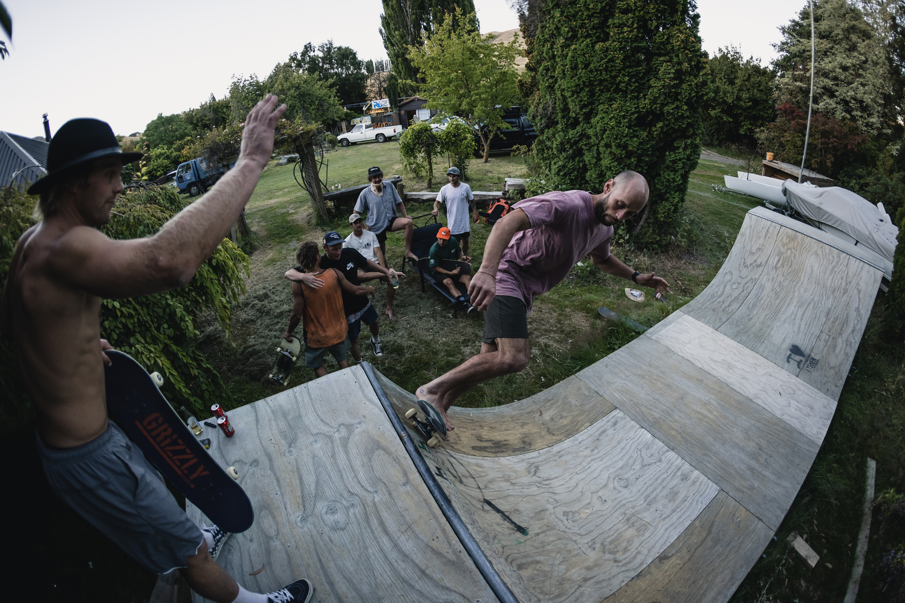 Eddie Masters skateboarding on a backyard mini ramp