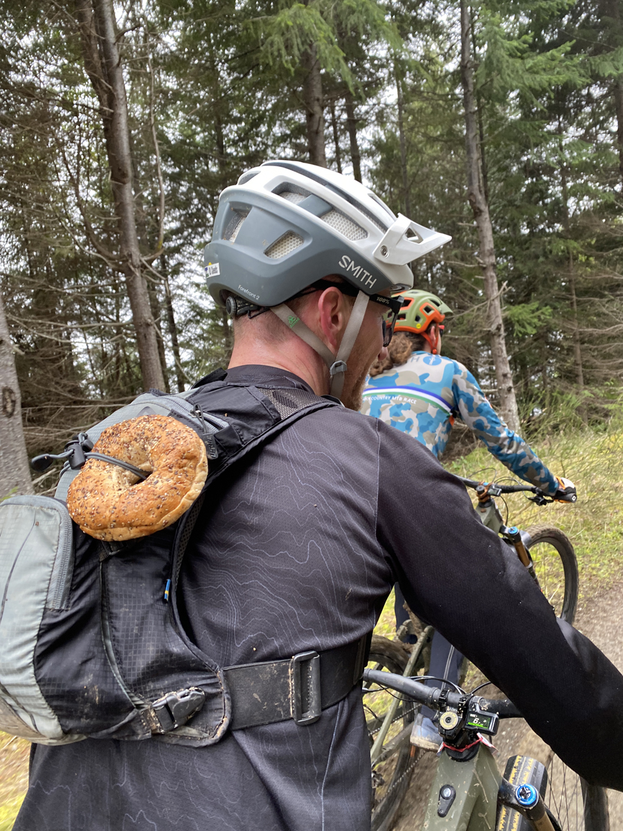 Bagel on the backpack for a trail side snack mountain biking 