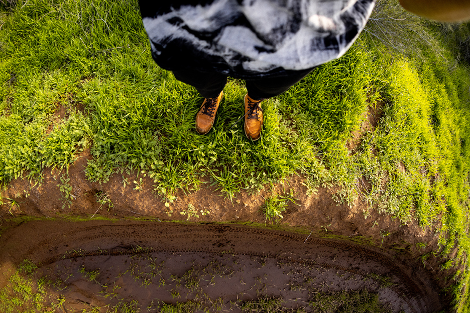 Heather Young Taking a photo of a berm 