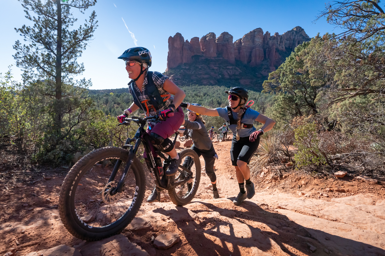 Sedona riding isn’t easy… sometimes you need just a little extra push from Jill Kitner and Stephanie McDaniel. Photo from the all-women group ride.