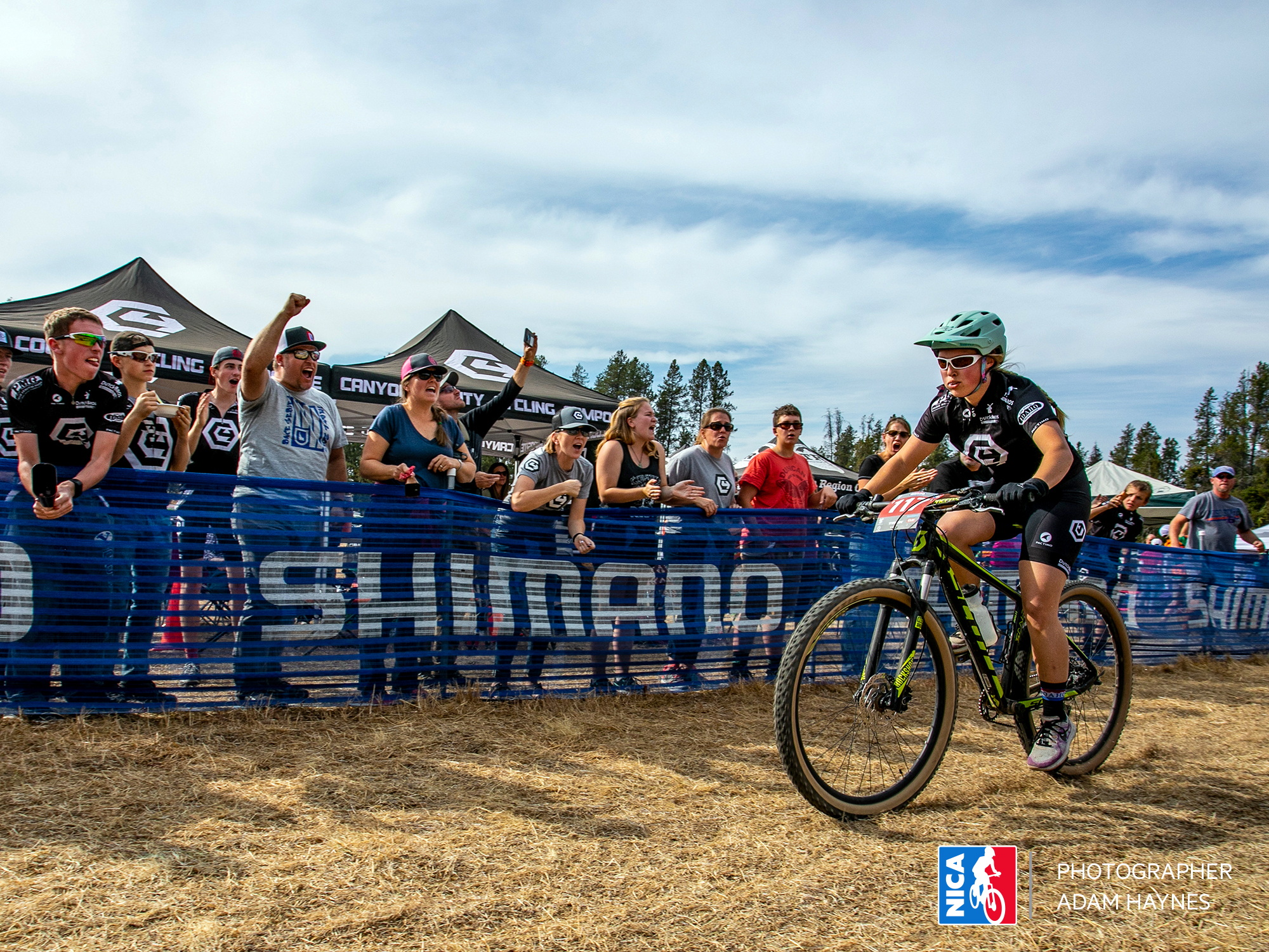 Crossing the finish line at a high school NICA bike race